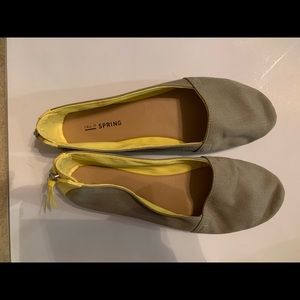Grey and yellow flats